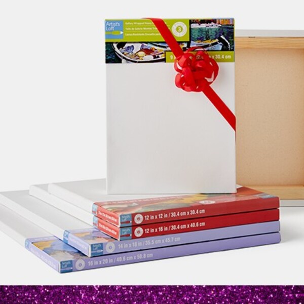 assorted blank canvases with red bow